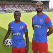 Dagenham & Redbridge forwards Josh Walker and Paul McCallum pose in the club's new away kit