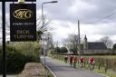 Cyclists made their way past the Dick Turpin Steakhouse in Aldborough Road North. Picture: Ron Jeffries.