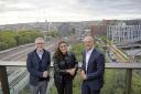 Councillor Nasrine Djemai, (centre), John Mulryan, Managing Director Ballymore (left) and Rob Beacroft, Lateral Co-Founder (right) in front of the Camley Street site