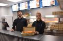 Siblings Ercan and Tuvana behind the counter at Ocean Bites Fish and Chips