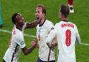 England’s Raheem Sterling, Harry Kane and Jordan Henderson celebrate winning the UEFA Euro 2020 semi final match at Wembley Stadium, London. Picture date: Wednesday July 7, 2021.