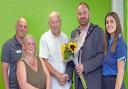 (From L to R) Andrew Cummins, Cllr Simone Taylor, Chris Jarvis, Chair of HDC Cllr Michael Burke and Freya Gheshash