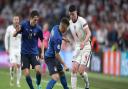 England's Declan Rice (right) battles with Italy's Giovanni Di Lorenzo (centre) and Federico Chiesa during the UEFA Euro 2020 Final at Wembley Stadium, London. Picture date: Sunday July 11, 2021.