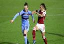 West Ham United's Kate Longhurst (left) and Arsenal's Jordan Nobbs battle for the ball during the FA Women's Super League match at Meadow Park, Borehamwood. Picture date: Wednesday April 28, 2021.