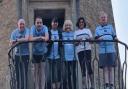 Ilford AC runners at the finish line, Harwich Lighthouse.