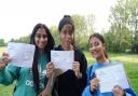 Beal High School pupils Maya Paul, Jade Patrick-Dunn, and Harlin Kaur celebrate their results.