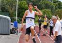 Jacob Ecemagi of Ilford AC in action