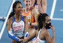 Bronze medalist Tiffany Porter of Great Britain (R) and silver medalist Cynthia Sember of Great Britain (L) celebrate following the Women's 60 Metres Hurdles final during the second session on Day 3 of the European Athletics Indoor Championships at Arena