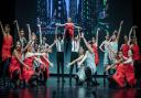 Children from Woodford's Stagecoach Performing Arts school on stage at His Majesty's Theatre Haymarket