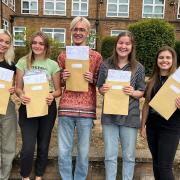 St Ivo students Maya Sirot-Smith, Sasha Brown, Nathan Woolley, Sophie Rogers and Ellie Collinge with their A-level results.