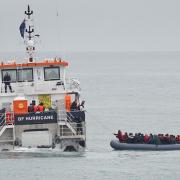 A group of people thought to be migrants are rescued off the coast of Folkestone, Kent in November