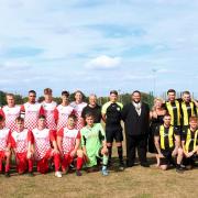 The former Needingworth Colts under 8's (Left) and 'Mayor's 11' (Right) at the Mayor's Charity Football Match