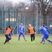 Action from the Essex Senior League derby between Tower Hamlets (orange) and Sporting Bengal United (blue) last season (pic: Tim Edwards).