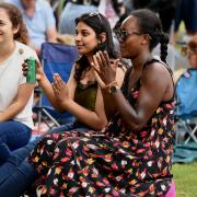 The audience applauding the main stage performers