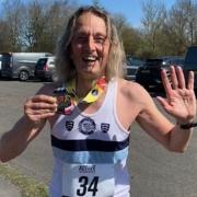 Ilford AC's Terry Knightley broke the male veteran over 60 club record in the Essex Half Marathon at Debden Airfield.