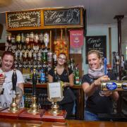 Staff members Lisa Wiles, Lina Masyte and Paula Raudzepa at The Prince of Wales in Ilford which opened its doors to serve its first drinks since lockdown began.