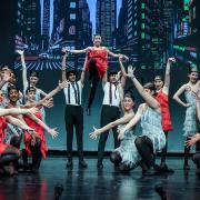 Children from Woodford's Stagecoach Performing Arts school on stage at His Majesty's Theatre Haymarket