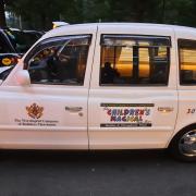 Part of the taxi convoy ready to set off from Canary Wharf