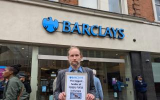 Cedric Knight protests outside Barclays bank on Ilford High Road