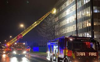 Five people required treatment after a fire tore through an Ilford flat today (December 13)